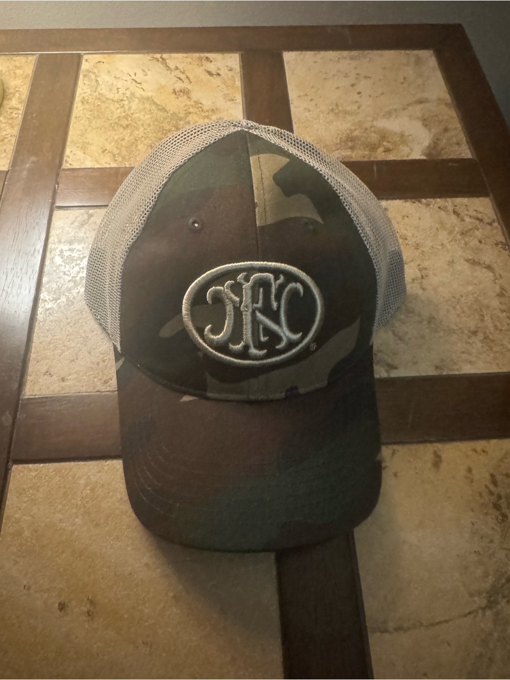 FN Firearms hat